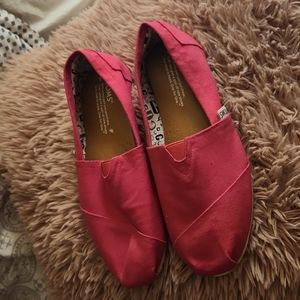 TOMS hot pink canvas shoes